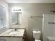 Bathroom features granite vanity, mirror, and updated fixtures plus toilet and shower at 3995 Willowbrook Dr, Douglasville, GA 30135