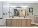 Bathroom offers a dual sink vanity with plenty of mirror space at 2060 Lake St, Loganville, GA 30052