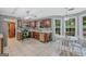Charming kitchen featuring dark cabinets, stainless appliances, and a cozy breakfast nook at 2060 Lake St, Loganville, GA 30052