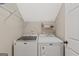 Efficient laundry room with modern Maytag washer and dryer at 2060 Lake St, Loganville, GA 30052