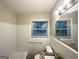 Bathroom featuring a granite countertop and neutral wall and tile colors at 2610 Preston Dr, Decatur, GA 30034