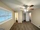 Bedroom with a ceiling fan, closet, and bright natural light coming in from the windows at 2610 Preston Dr, Decatur, GA 30034