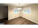 Dining area illuminated by a chandelier, showcasing hardwood floors and natural light at 2610 Preston Dr, Decatur, GA 30034