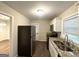 Modern kitchen with updated countertops, stainless steel appliances, and new flooring at 2610 Preston Dr, Decatur, GA 30034