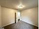 Bedroom with neutral walls, carpet, and a closet at 2930 Waters Rd, Atlanta, GA 30354