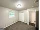 Bedroom featuring neutral walls, carpet, and a closet at 2930 Waters Rd, Atlanta, GA 30354