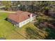 Aerial view showcasing the backyard, patio, and mature trees of this property with a well-maintained yard at 425 Wendy Ct, Mcdonough, GA 30252
