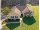 An aerial shot of the charming single-story home and manicured front yard at 425 Wendy Ct, Mcdonough, GA 30252