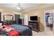 Comfortable bedroom featuring classic dark wood furniture and a walk-in closet at 425 Wendy Ct, Mcdonough, GA 30252