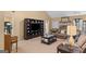 Spacious living room with an entertainment center and fireplace at 425 Wendy Ct, Mcdonough, GA 30252