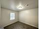Bright bedroom with large window, neutral paint, carpet and a ceiling light at 660 Thomasville Se Blvd, Atlanta, GA 30315