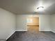 A spacious living room with carpet flooring and neutral color palette at 660 Thomasville Se Blvd, Atlanta, GA 30315