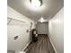 Spacious utility room with updated flooring and ample space for laundry at 660 Thomasville Se Blvd, Atlanta, GA 30315