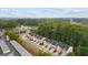 Aerial view of townhomes, showing neighborhood layout, streetscape, and community features at 881 Whittington Sw Pkwy, Marietta, GA 30060