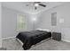 Cozy bedroom with neutral colors, a ceiling fan, and plush carpeting at 881 Whittington Sw Pkwy, Marietta, GA 30060
