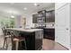 Modern kitchen island with granite countertops and stainless steel appliances at 881 Whittington Sw Pkwy, Marietta, GA 30060