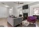 Cozy living room with a sleek fireplace, hardwood floors, and modern decor at 881 Whittington Sw Pkwy, Marietta, GA 30060