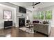 Bright living room featuring hardwood floors, fireplace, and ample natural light at 881 Whittington Sw Pkwy, Marietta, GA 30060