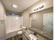 Bright bathroom features a granite vanity, tub/shower combo, and neutral tones at 263 Coral Cir, Mcdonough, GA 30253
