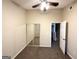 Neutral bedroom featuring carpeted floors and a mirror sliding door closet at 263 Coral Cir, Mcdonough, GA 30253