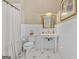 Bathroom featuring vintage fixtures, subway tile, and chandelier at 29 Indian Creek Rd, Locust Grove, GA 30248