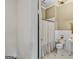 Small bathroom featuring vintage fixtures, subway tile, and toilet at 29 Indian Creek Rd, Locust Grove, GA 30248