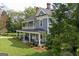 Beautiful two-story home with a covered porch, mature landscaping, and charming curb appeal at 29 Indian Creek Rd, Locust Grove, GA 30248