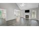 Open-concept living room boasts vaulted ceilings, fireplace, and seamless flow at 35 Wenham Ln, Sharpsburg, GA 30277