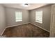 Bedroom with carpeted floors, natural light, and neutral paint at 830 Mercury Dr, Atlanta, GA 30331
