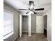 Bedroom with carpeted floors, ceiling fan, and closet at 830 Mercury Dr, Atlanta, GA 30331