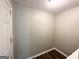 Interior shot of a room with light gray walls and dark-colored wood flooring at 830 Mercury Dr, Atlanta, GA 30331