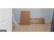 View of a storage attic with carpet and boxes for storage at 1442 Swiftwater Cir, Mcdonough, GA 30252