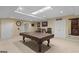 Basement area featuring a pool table, seating area, and neutral-colored walls at 1442 Swiftwater Cir, Mcdonough, GA 30252