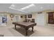 Basement area featuring a pool table, seating area, and neutral-colored walls at 1442 Swiftwater Cir, Mcdonough, GA 30252