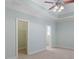 Bright, cozy bedroom features neutral paint colors and a ceiling fan for optimal comfort and relaxation at 1442 Swiftwater Cir, Mcdonough, GA 30252