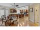Eat-in kitchen with custom wood cabinets, stainless appliances, and a center island with seating at 1442 Swiftwater Cir, Mcdonough, GA 30252