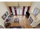 Open concept living room with high ceilings, fireplace and access to the deck at 1442 Swiftwater Cir, Mcdonough, GA 30252