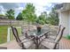 Outdoor back deck featuring dining seating arrangement, creating a perfect space for outdoor meals at 1484 Stephens Pond Vw, Loganville, GA 30052