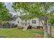 Backyard featuring a well-maintained deck, creating the perfect outdoor spot for dining at 1484 Stephens Pond Vw, Loganville, GA 30052