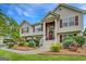 Charming two-story home with well-maintained landscaping, complemented by a welcoming front entrance at 1484 Stephens Pond Vw, Loganville, GA 30052