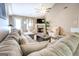 Bright living room features vaulted ceilings, fireplace, plush seating, and an open-concept design at 1484 Stephens Pond Vw, Loganville, GA 30052