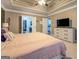 Bright main bedroom with ensuite bathroom and kitchen access at 1484 Stephens Pond Vw, Loganville, GA 30052
