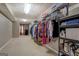 Spacious walk-in closet with ample shelving and hanging space for organized storage solutions at 1484 Stephens Pond Vw, Loganville, GA 30052