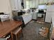 Functional kitchen features stainless steel appliances, ample cabinetry, and tile flooring at 1990 Shamrock Dr, Decatur, GA 30032