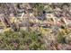 Birds eye view showing property and neighborhood; showcasing the area's layout and green spaces at 55 Helen Ln, Stockbridge, GA 30281