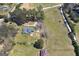An aerial shot capturing the expansive property, showcasing the serene landscape and charming residence at 1092 E Lake Rd, Mcdonough, GA 30252