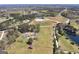 Vast land parcel showcases lush greenery, a home, and a tranquil pond, ideal for outdoor enjoyment at 1092 E Lake Rd, Mcdonough, GA 30252