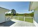 An inviting outdoor living space with expansive views of the lush green backyard at 1092 E Lake Rd, Mcdonough, GA 30252