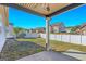View of the fenced backyard and covered patio at 1141 Abundance Dr, Locust Grove, GA 30248