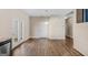 Bright dining area with hardwood floors, access to patio, and neutral paint scheme at 1141 Abundance Dr, Locust Grove, GA 30248